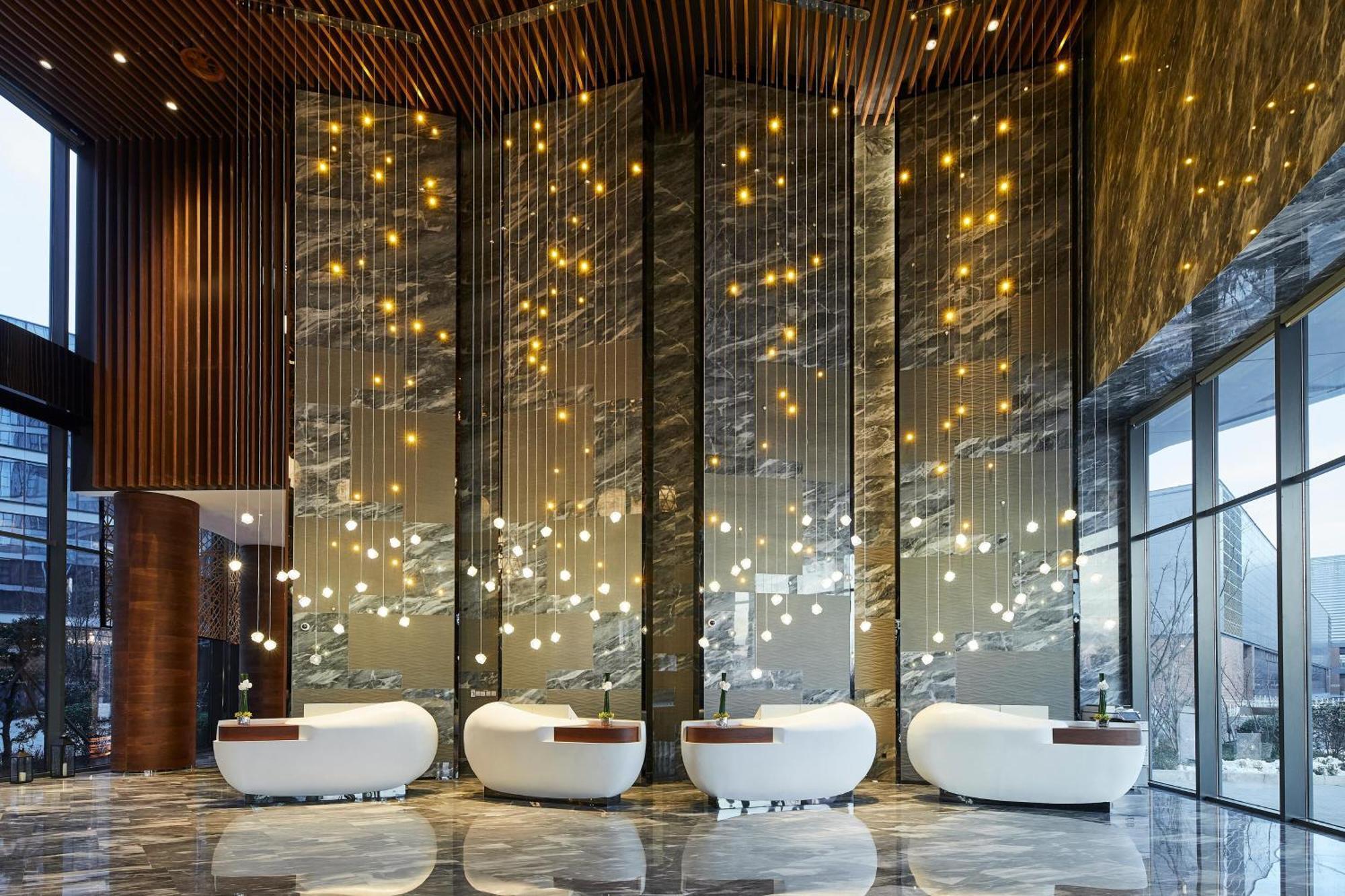 Отель The Westin Qingdao West Coast Экстерьер фото