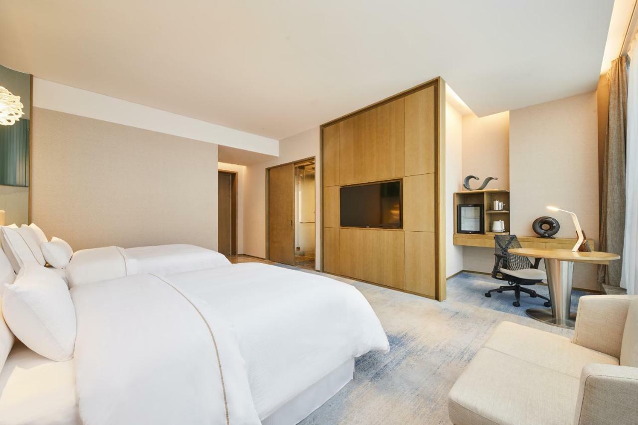 Отель The Westin Qingdao West Coast Экстерьер фото